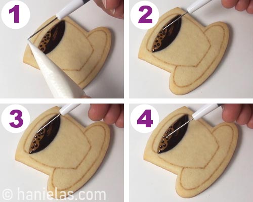 Using a needle tool to add tiny white dots of icing onto an iced cookie.