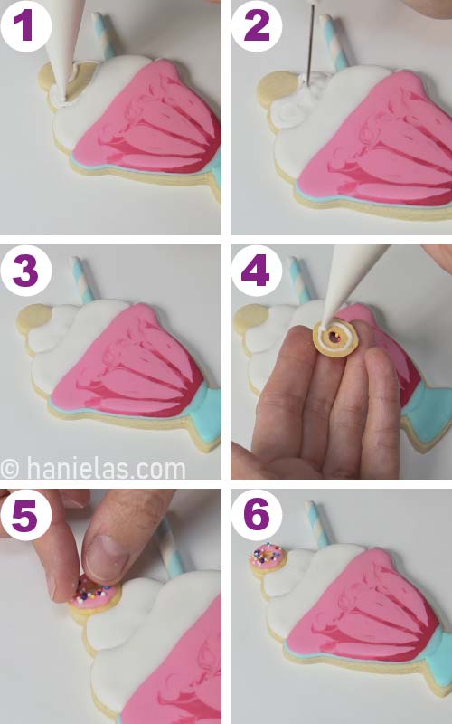 Pipe icing on the back of a donut decoration and glue it onto a cookie.