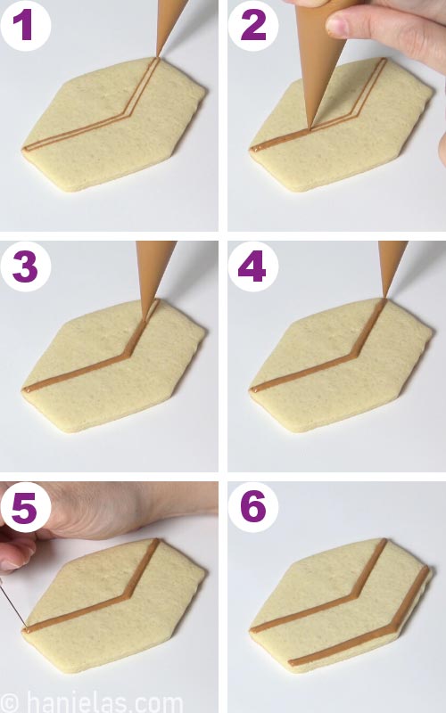 Piping icing onto a cookie creating a graham cracker design.