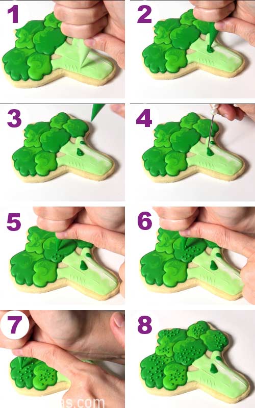 Piping leaves onto broccoli cookie.