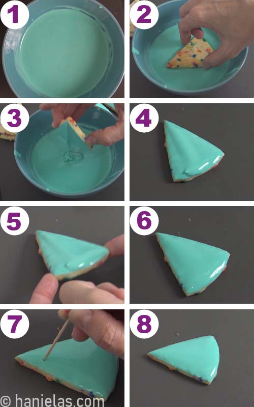 Dipping a cookie into icing.