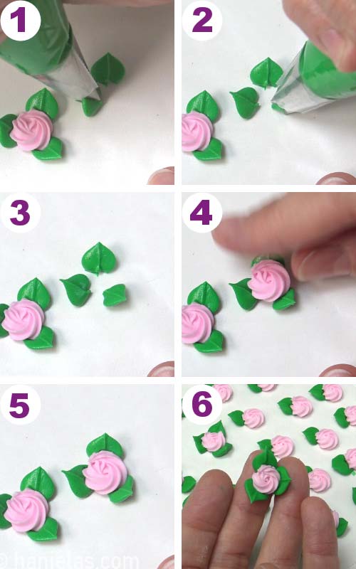 Piping 3 leaves onto a wax paper and pushing a swirl rose onto the leaves.