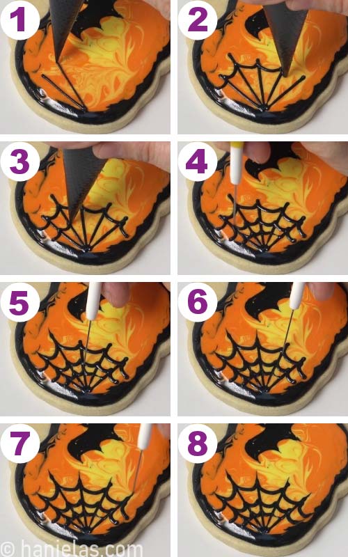 Piping black spider web onto a wet orange icing.