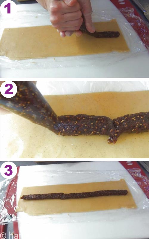 Piping fig collez le remplissage sur un biscuit.
