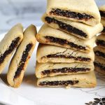 Fig Newton Cookies stacked on a plate.