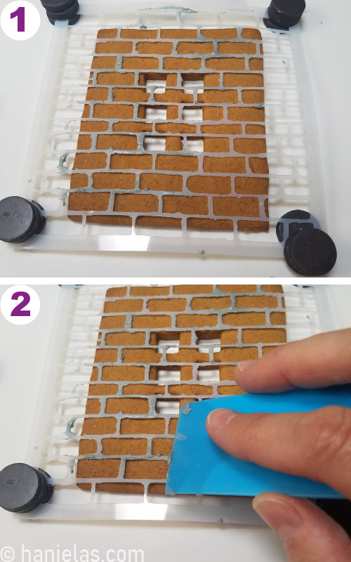 Brick stencil secured with magnets over a cookie.