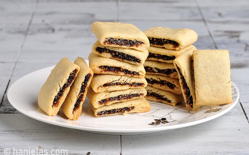 Baked fig newton cookie on a whiteplate.