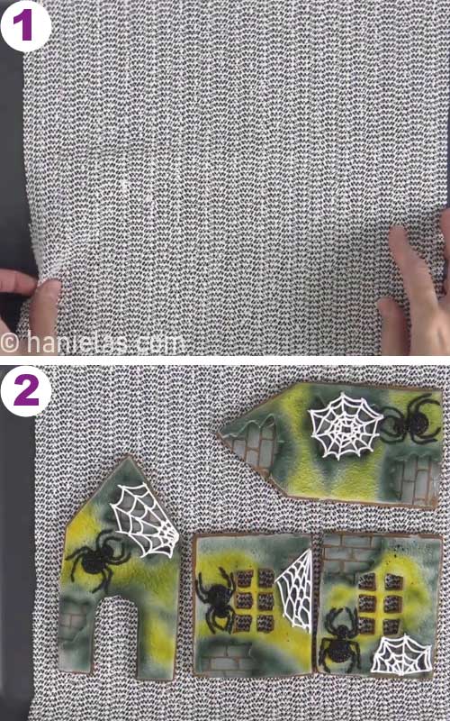Decorated gingerbread house panels laid on a rubber liner.