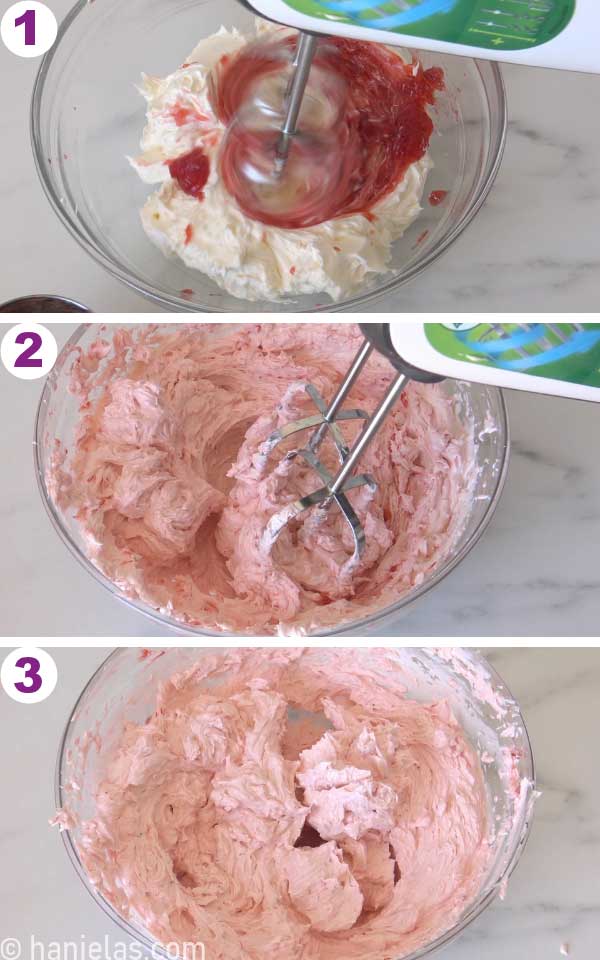 Beater mixing strawberry jam into buttercream.