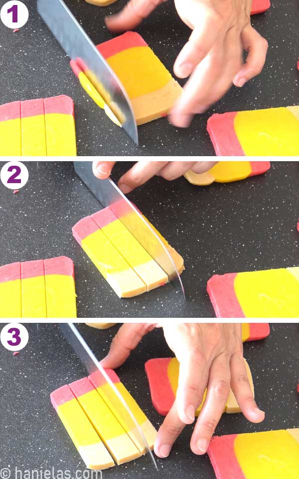 Slicing a piece of colored cookie dough slice into three strips.