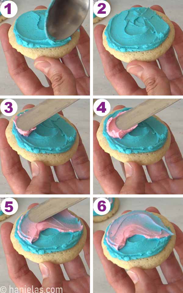 Spreading buttercream onto a cookie with a spoon.