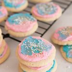 Stacked buttercream decorated cookies.