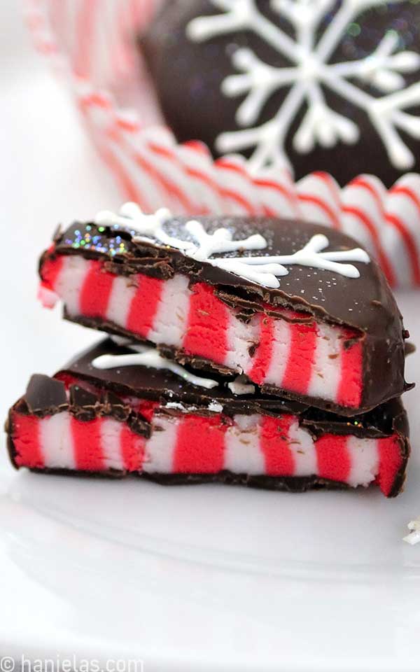 Close up of slice candy cane peppermint patty on a white plate.