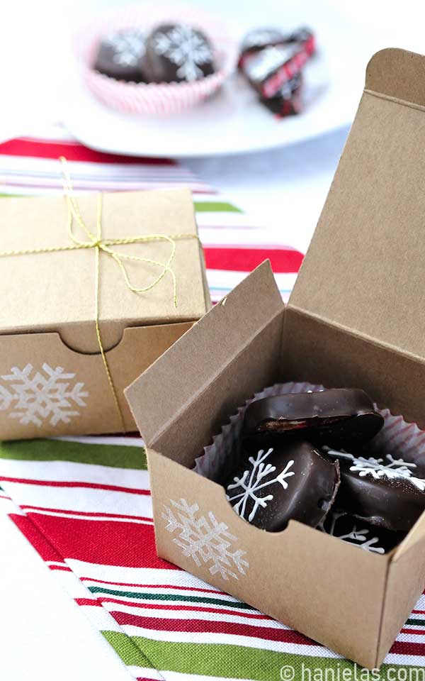 Chocolate mint candies in a brown gift box.