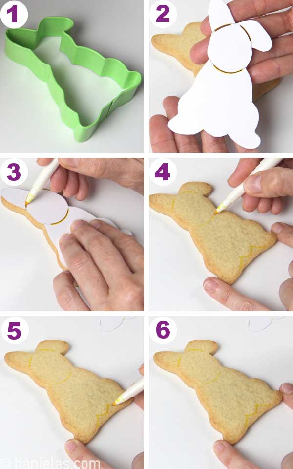 Tracing a guide onto a cookie using a cardstock template and edible marker.