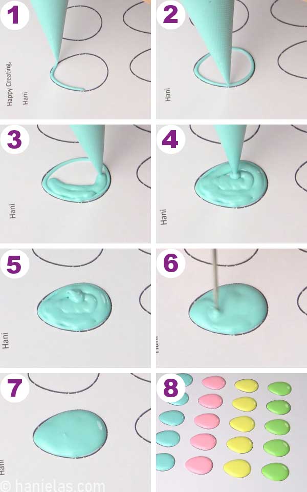 Piping bag with teal icing, piping small eggs onto a protector sheet.