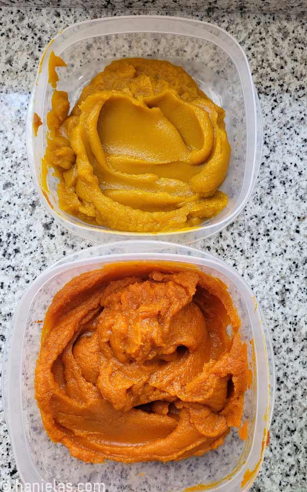 Yellow and orange pumpkin puree in plastic containers.