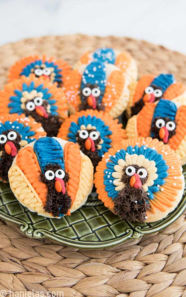 Round cookies decorated with colored buttercream.