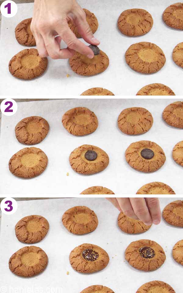 Hand placing a chocolate disk onto a warm cookie.