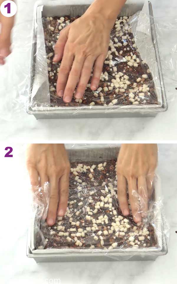 Hands covering the cookie chocolate slab in a baking pan with a food wrap.