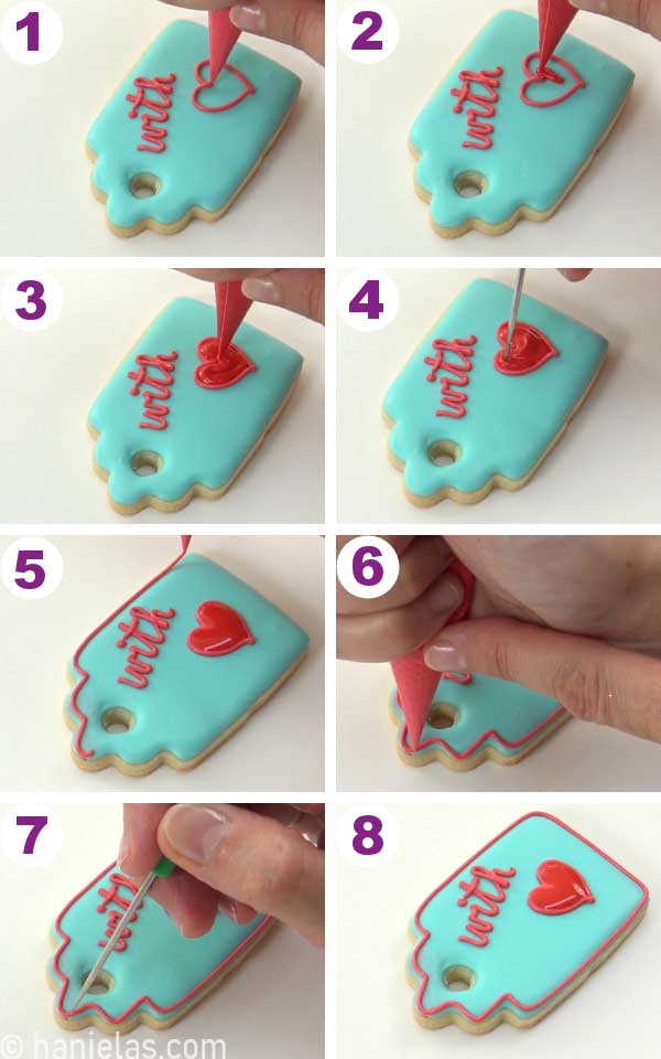 Cookie decorated with teal icing and red heart.