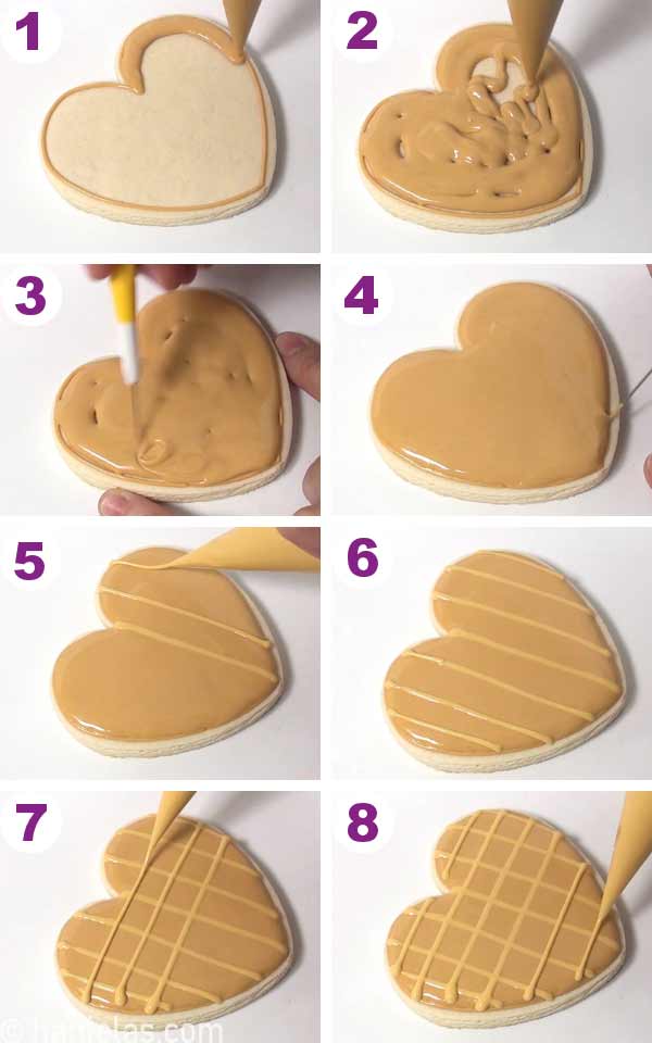 A cookie flooded with royal icing, piping bag piping a grid onto wet icing.