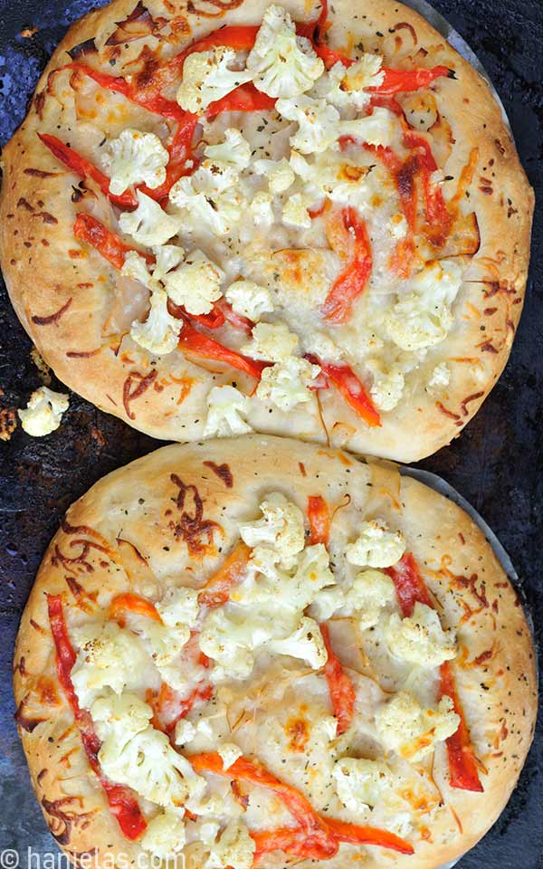 View from the above on two baked pizzas.