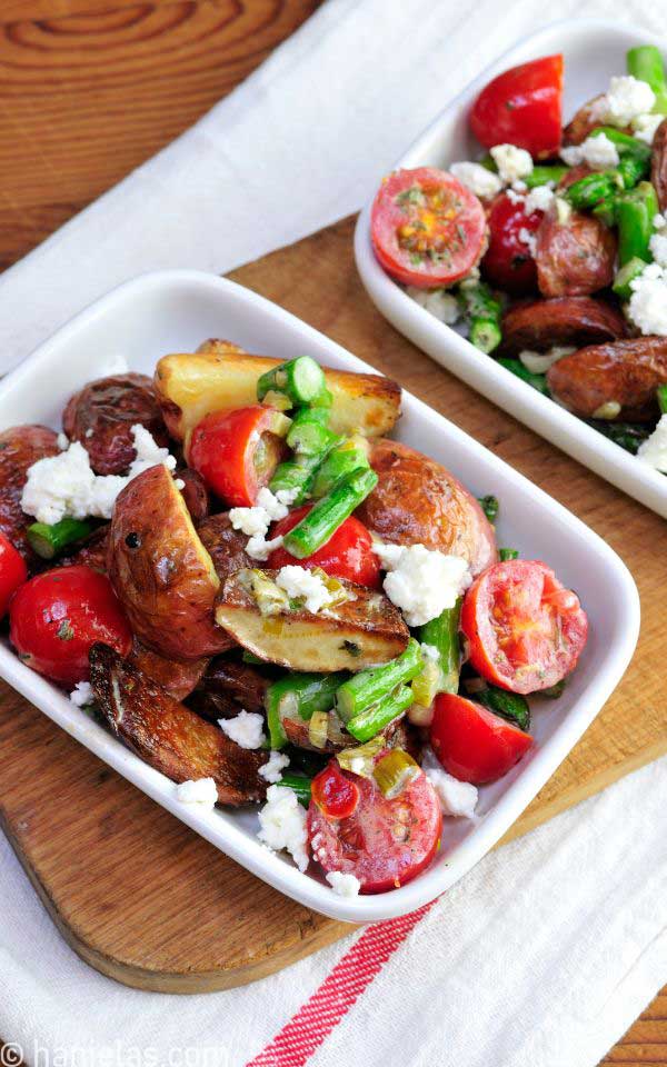 Salad in a white rectangular dish.