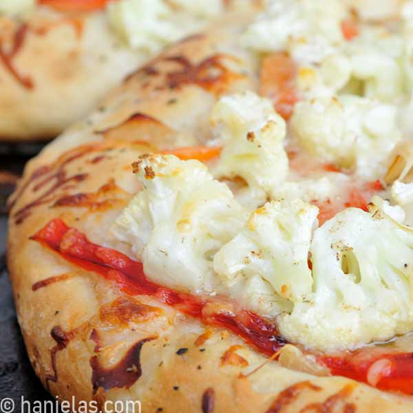 Close-up of baked pizza crust.