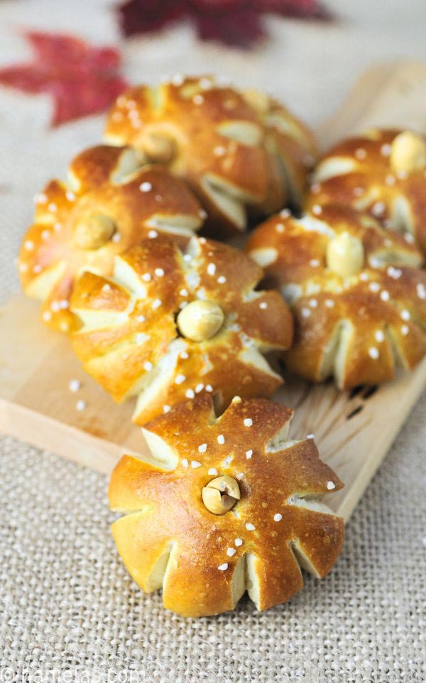 A close up of golden brown baked buns.