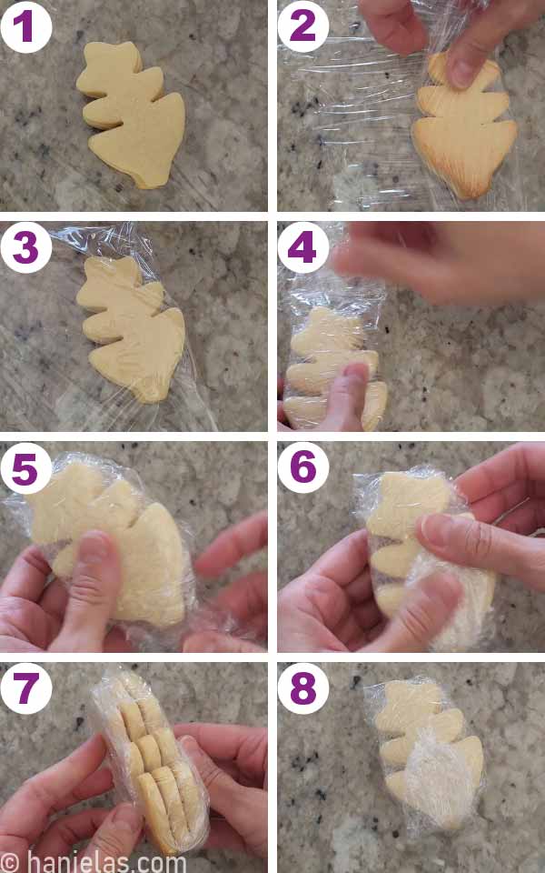 Several cut out cookie wrapped in food wrap.