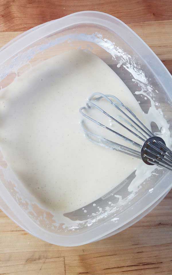 A plastic container with white glaze.