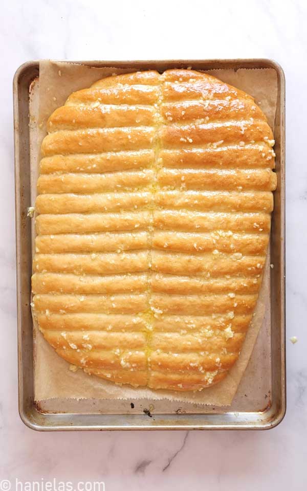 Baked bread on a baking sheet.