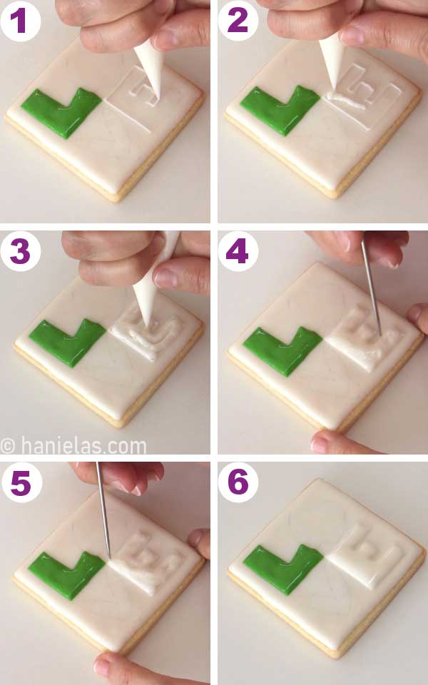 Square cookie, outlining, and flooding a letter with white icing.