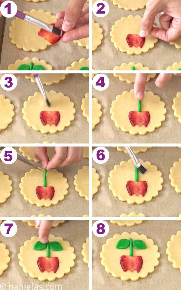 Assembling dry strawberry slice onto a cookie.