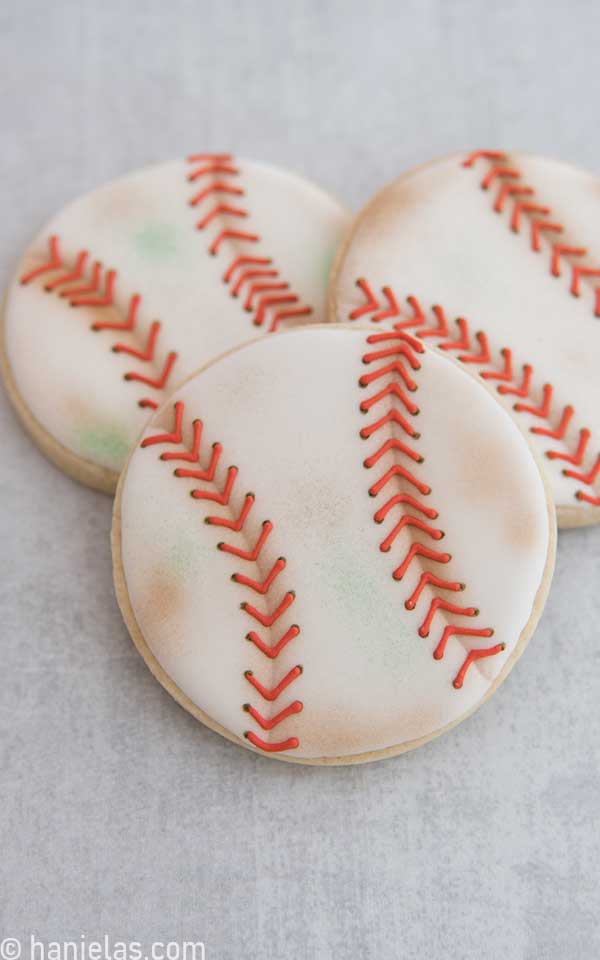 Round cookies decorated with royal icing.
