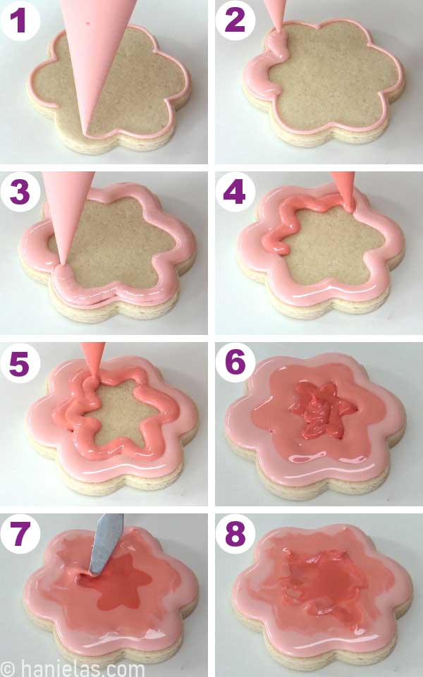 Outlining and flooding a cookie with three shapes of pink icing.