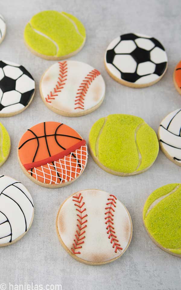 Assortment of decorated sport cookies.
