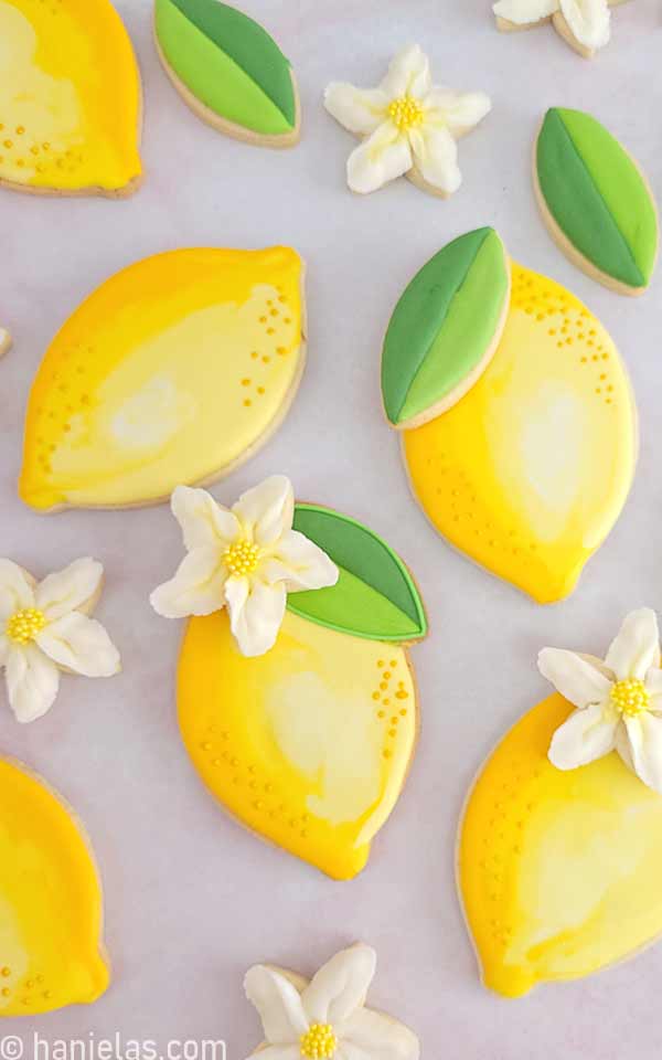 Decorated cookies in the shape of a lemon.