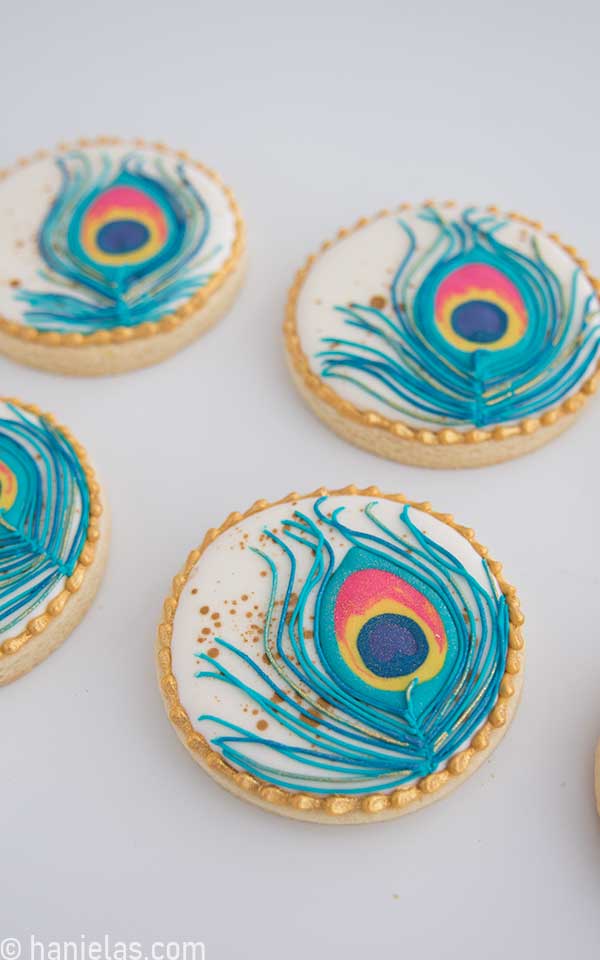 Round cookies decorated with royal icing.