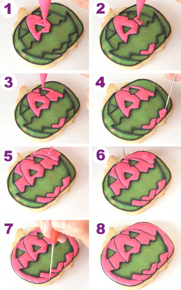 Scribe tool smoothing icing on a cookie.