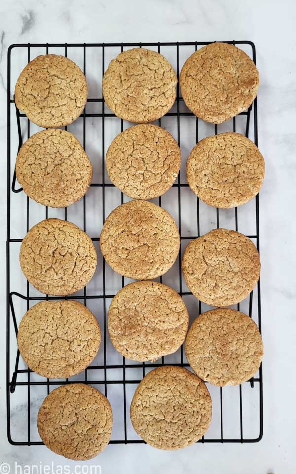 Baked cookies on a cooling rack.