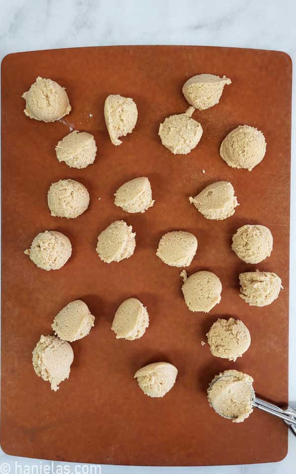 Cookie dough balls on a tray.