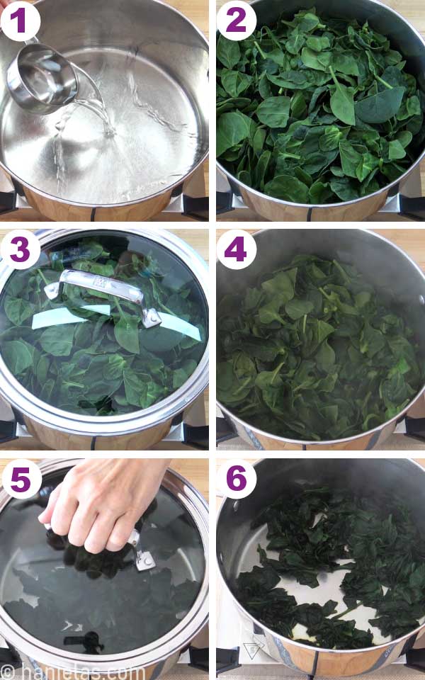 A stainless steel pot with steamed spinach leaves.