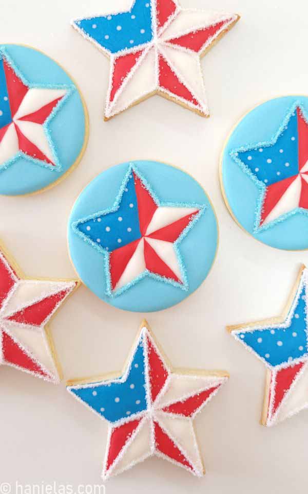 Round and star cookies decorated with royal icing.