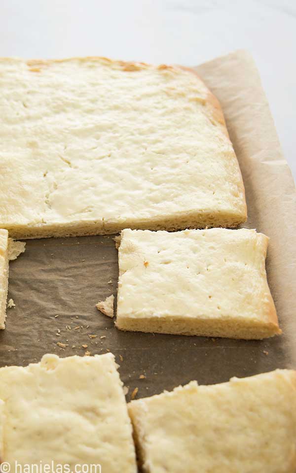 Baked bread with creamy topping.