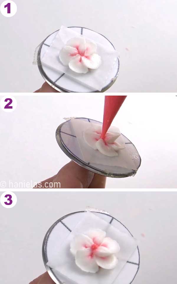 Flower nail with a white pink flower.