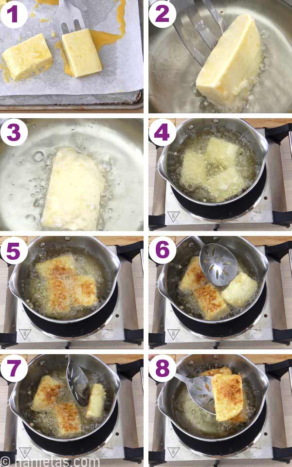 A stainless steel pot with hot oil, frying custard cakes in the oil.