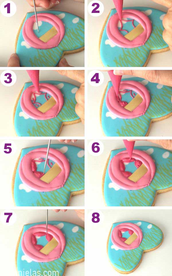 Shaping a piped detail with a scribe.