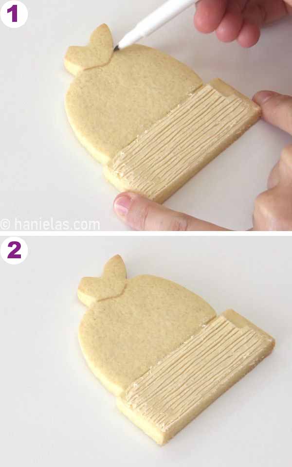 Drawing a decorating guide onto a cookie.